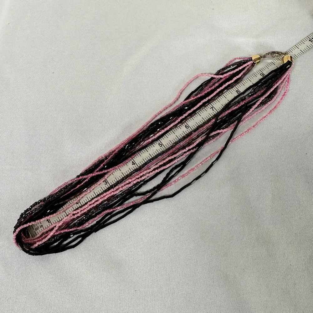 Pink and black multi strand necklace